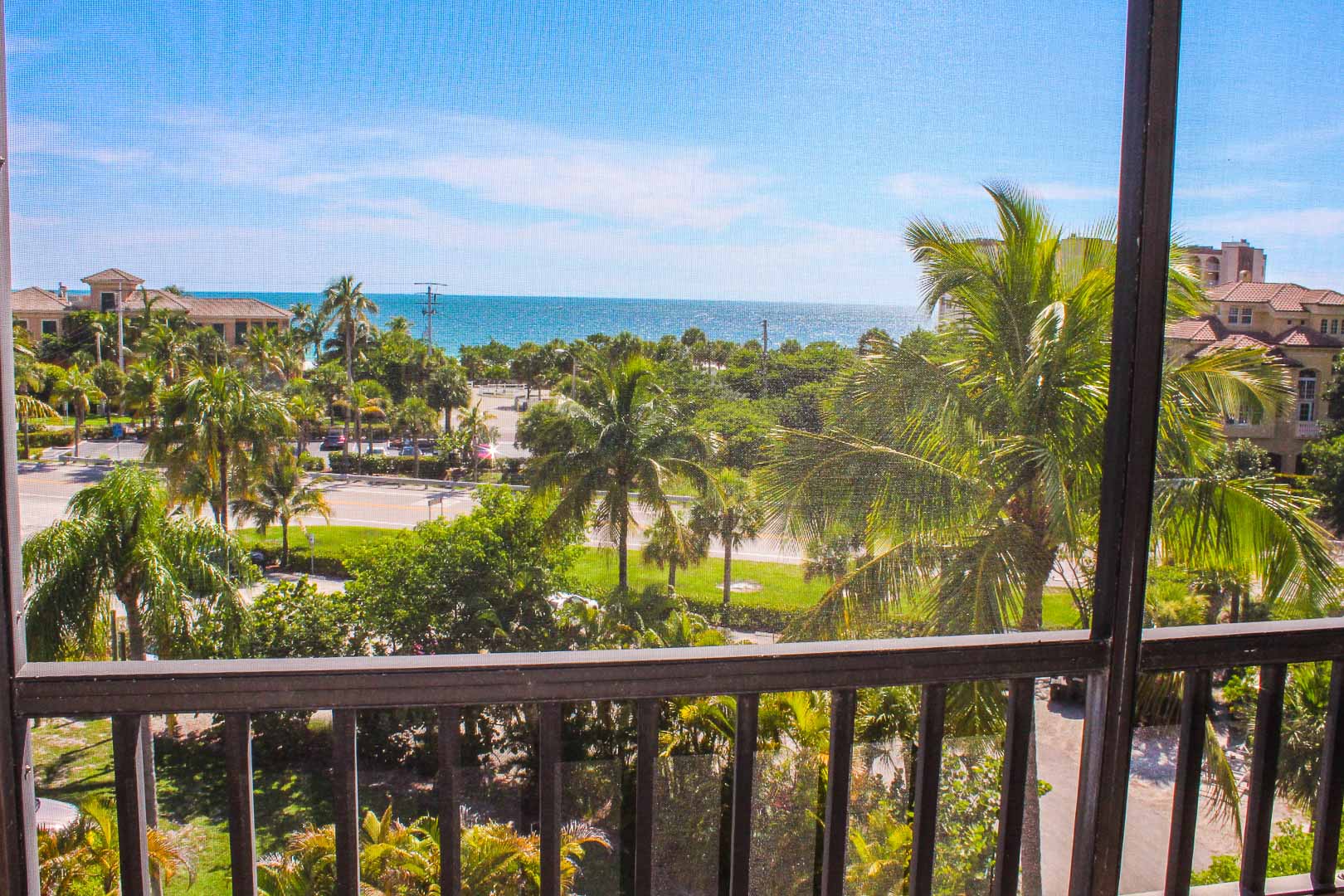 A beautiful beach view from the balcony at VRI's Bonita Resort and Club in Florida.